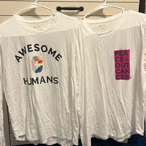 Two limited edition Figs under scrub shirts